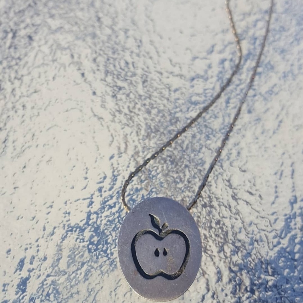 Silver apple stencil necklace